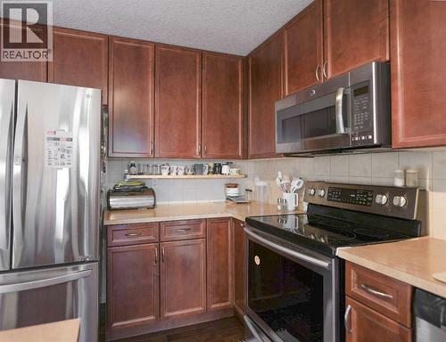 125 Silverado Range Cove Sw, Calgary, AB - Indoor Photo Showing Kitchen