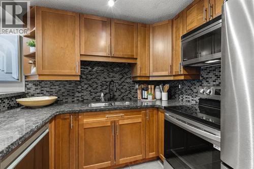 603, 1011 12 Avenue, Calgary, AB - Indoor Photo Showing Kitchen With Double Sink