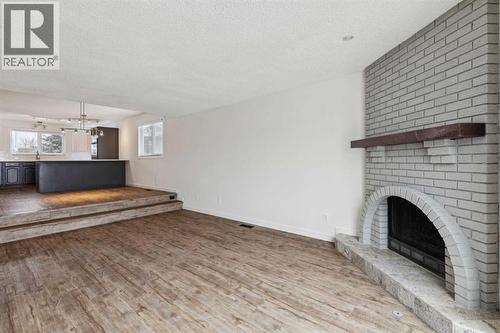 220 Templeby Place Ne, Calgary, AB - Indoor With Fireplace