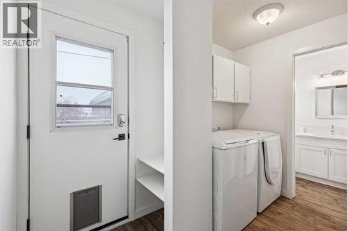 220 Templeby Place Ne, Calgary, AB - Indoor Photo Showing Laundry Room