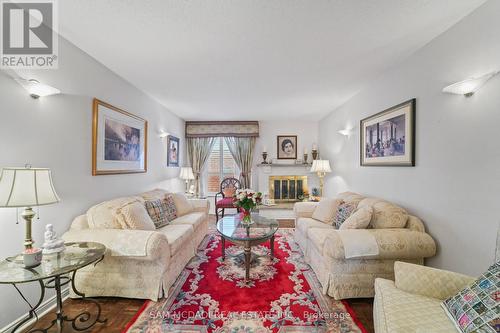1004 Queensbridge Drive, Mississauga, ON - Indoor Photo Showing Living Room With Fireplace