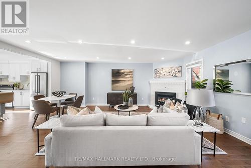 64 Sylvan Valley Way, Toronto, ON - Indoor Photo Showing Living Room With Fireplace