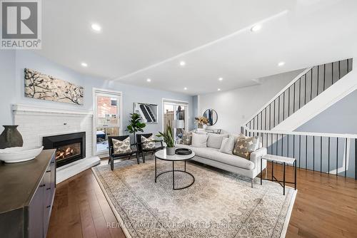 64 Sylvan Valley Way, Toronto, ON - Indoor Photo Showing Living Room With Fireplace