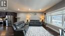 414 Ells Way, Saskatoon, SK  - Indoor Photo Showing Living Room 