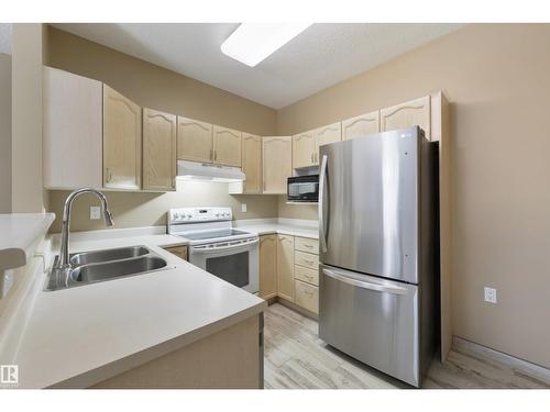 #232 15499 Castle Downs Rd Nw, Edmonton, AB - Indoor Photo Showing Kitchen With Double Sink
