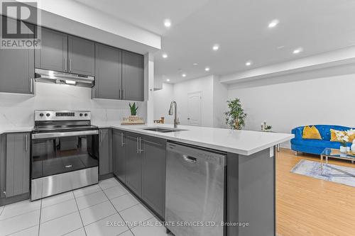 13 Ormand Terrace, Caledon, ON - Indoor Photo Showing Kitchen With Double Sink With Upgraded Kitchen