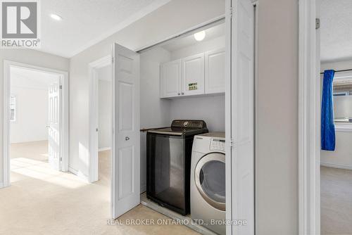 Convenient 2nd level laundry closet - 2014 Jasper Avenue, Ottawa, ON - Indoor Photo Showing Laundry Room