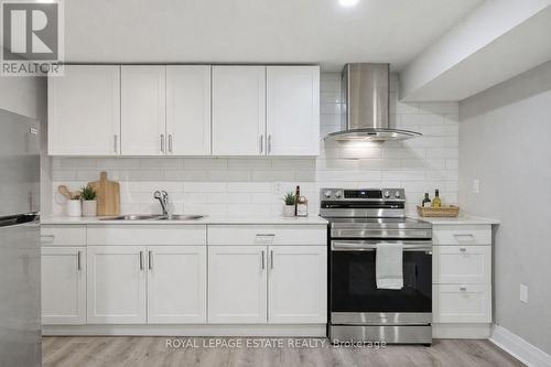 Virtually staged to show potential - 253 Michael Boulevard, Whitby, ON - Indoor Photo Showing Kitchen With Double Sink With Upgraded Kitchen