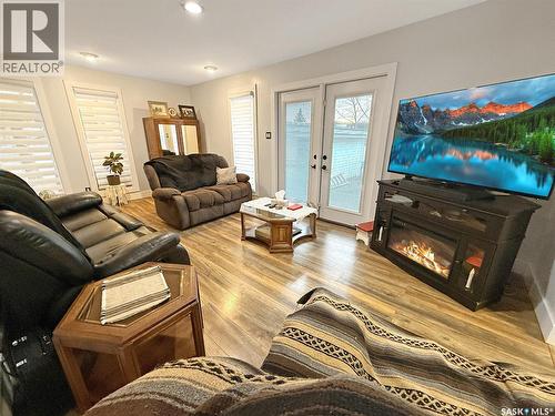 1102 Golden Place, Swift Current, SK - Indoor Photo Showing Living Room With Fireplace