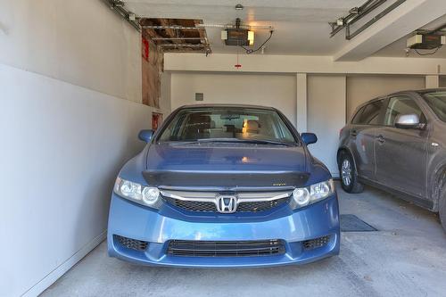 Garage - 6-6060 Rue Gabrielle-Roy, Longueuil (Saint-Hubert), QC - Indoor Photo Showing Garage