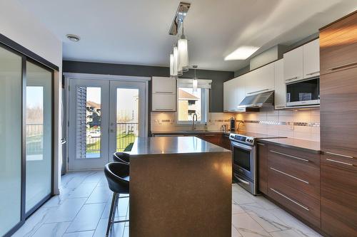 Cuisine - 6-6060 Rue Gabrielle-Roy, Longueuil (Saint-Hubert), QC - Indoor Photo Showing Kitchen