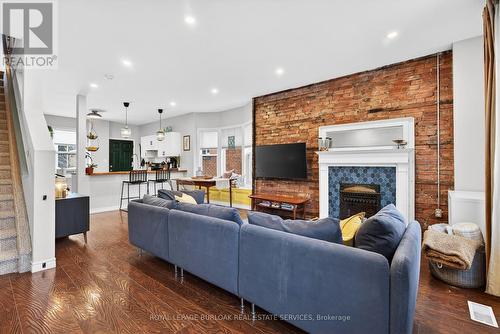 792 Cannon Street E, Hamilton, ON - Indoor Photo Showing Living Room With Fireplace