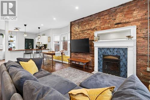 792 Cannon Street E, Hamilton, ON - Indoor Photo Showing Living Room With Fireplace