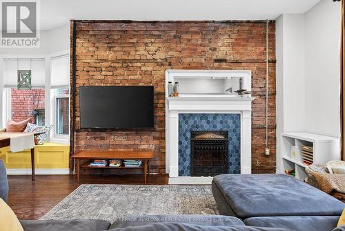 792 Cannon Street E, Hamilton, ON - Indoor Photo Showing Living Room With Fireplace