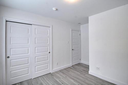 Chambre à coucher principale - 32 Rue Sévigny, Val-D'Or, QC - Indoor Photo Showing Other Room