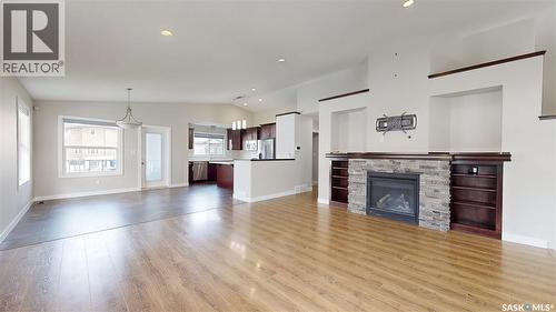 5614 Beacon Place, Regina, SK - Indoor Photo Showing Living Room With Fireplace