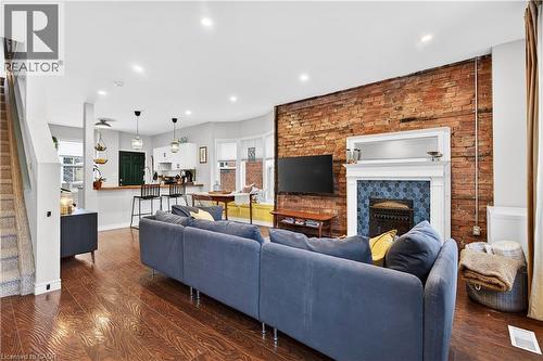792 Cannon Street E, Hamilton, ON - Indoor Photo Showing Living Room With Fireplace