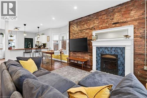 792 Cannon Street E, Hamilton, ON - Indoor Photo Showing Living Room With Fireplace