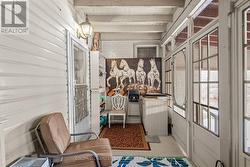 Side porch - in to mudroom and out to carport - 