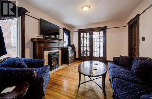 48 Longwood Road N, Hamilton, ON - Indoor Photo Showing Living Room With Fireplace