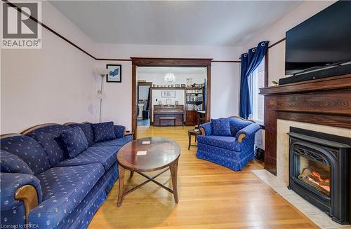 48 Longwood Road N, Hamilton, ON - Indoor Photo Showing Living Room With Fireplace