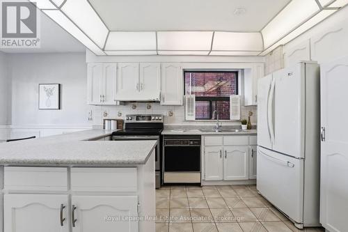 439 Salem Avenue N, Toronto, ON - Indoor Photo Showing Kitchen With Double Sink