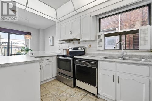 439 Salem Avenue N, Toronto, ON - Indoor Photo Showing Kitchen With Double Sink