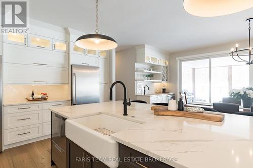 1555 Baseline Road S, Tiny, ON - Indoor Photo Showing Kitchen With Upgraded Kitchen