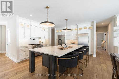 1555 Baseline Road S, Tiny, ON - Indoor Photo Showing Kitchen With Upgraded Kitchen