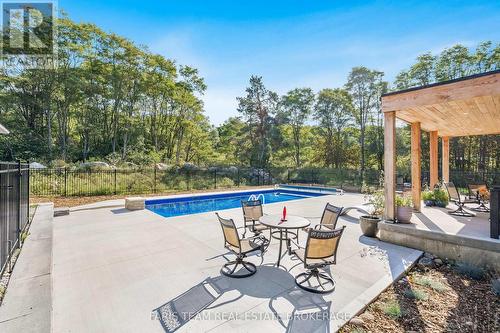 1555 Baseline Road S, Tiny, ON - Outdoor With In Ground Pool With Backyard