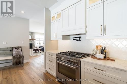 1555 Baseline Road S, Tiny, ON - Indoor Photo Showing Kitchen With Upgraded Kitchen