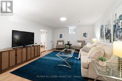 Basement rec room w updated flooring. - 