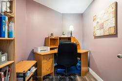 large Walk-in closet used as an office - 