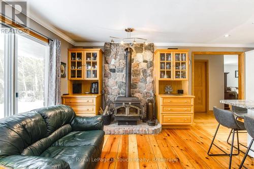 2554 Champlain Road, Tiny, ON - Indoor With Fireplace