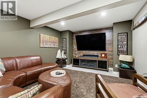 52 Kensington Crescent, Regina, SK - Indoor Photo Showing Living Room With Fireplace