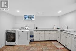 Laundry and Bonus Room with Sink - 