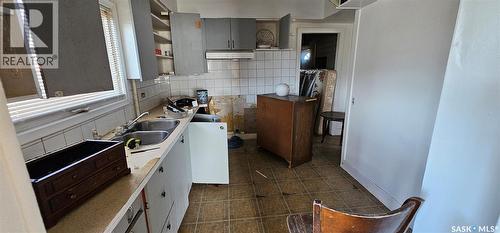 102 3Rd Avenue E, Kelvington, SK - Indoor Photo Showing Kitchen With Double Sink