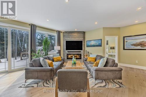 15 Stoney Road, Tiny, ON - Indoor Photo Showing Living Room With Fireplace