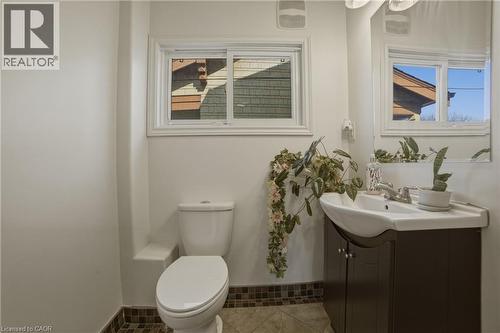 Main floor two peice bathroom! - 81 Ottawa Street N, Hamilton, ON - Indoor Photo Showing Bathroom