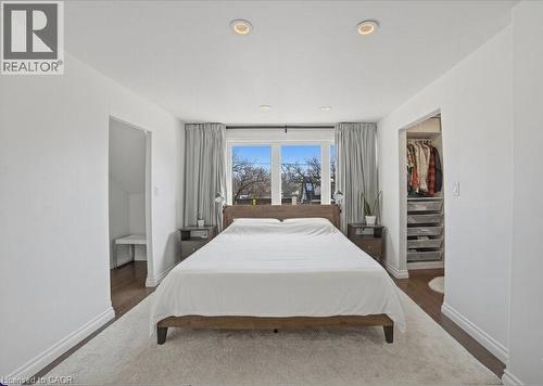 Primary bedroom with walk in closet! - 81 Ottawa Street N, Hamilton, ON - Indoor Photo Showing Bedroom