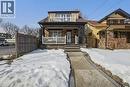 Large front porch with stone column frames! - 81 Ottawa Street N, Hamilton, ON  - Outdoor With Deck Patio Veranda With Facade 