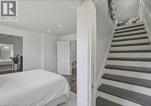 Primary bedroom with loft access. - 81 Ottawa Street N, Hamilton, ON - Indoor Photo Showing Bedroom