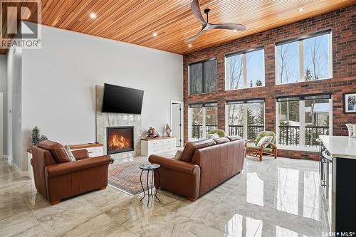 2 Bruin Boulevard, Candle Lake, SK - Indoor Photo Showing Living Room With Fireplace