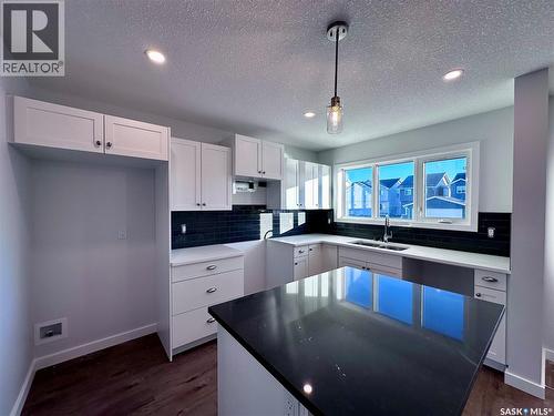 5457 Buckingham Drive E, Regina, SK - Indoor Photo Showing Kitchen With Double Sink