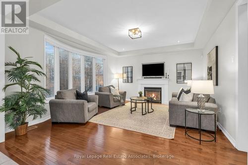 879 Etherington Way, Milton, ON - Indoor Photo Showing Living Room With Fireplace