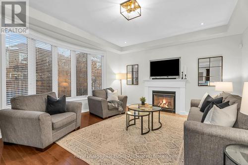 879 Etherington Way, Milton, ON - Indoor Photo Showing Living Room With Fireplace