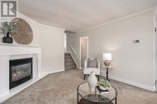 33 Gemini Drive, Hamilton, ON - Indoor Photo Showing Living Room With Fireplace