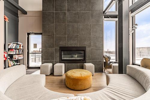 Common room - 320-3810 Rue St-Antoine O., Montréal (Le Sud-Ouest), QC - Indoor With Fireplace