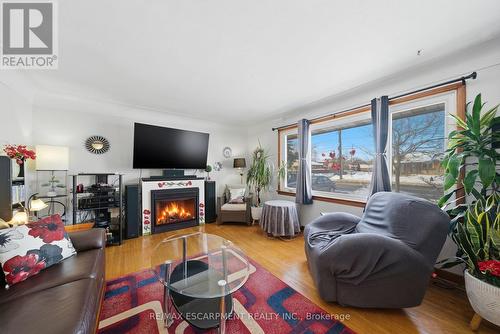 763 Upper Ottawa Street, Hamilton, ON - Indoor Photo Showing Living Room With Fireplace