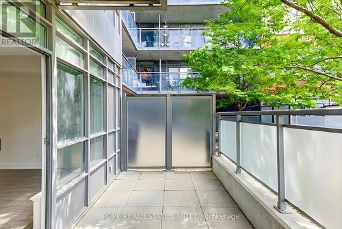 Terrace looking east - 312 - 38 Joe Shuster Way, Toronto, ON - Outdoor With Exterior